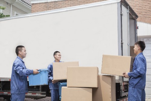 Professional movers handling fragile items during a Dulwich move