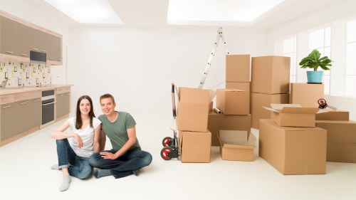 Packed household storage space in Dulwich with labelled boxes