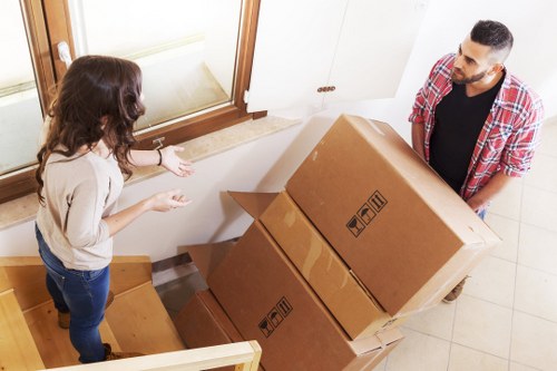 Packed moving boxes ready for flat removals in Dulwich