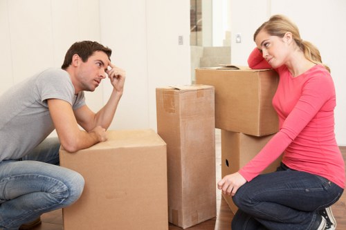 Organized storage facility with boxes and furniture